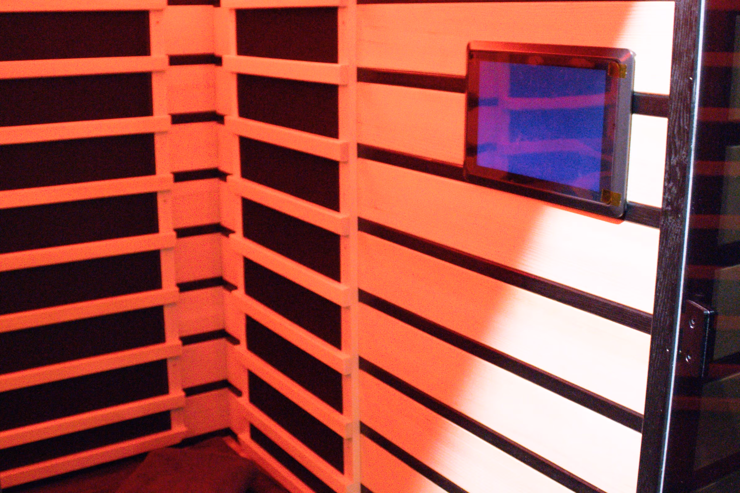 Inside the private infrared sauna room at Sabél Studios