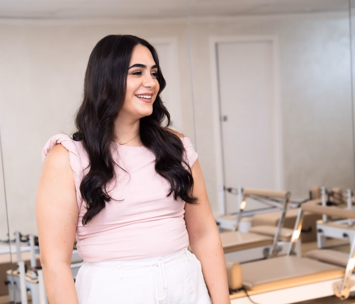 Sarah Daher, founder of Sabél Studios, in the reformer studio